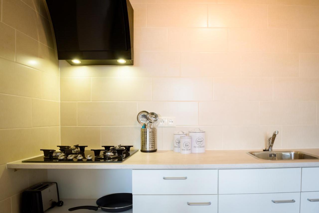 Appartement De Witte Brug Breezand ภายนอก รูปภาพ